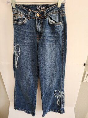 Mila Denim Jeans, a Classic Blue wash with Playful, Coquett  Style . Size: 30
